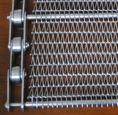 حزام ناقل شبكي سلكي حلزوني معدني من الفولاذ المقاوم للصدأ 304 وفولاذ الكربون المقاوم للحرارة المخصص للمخابز والبسكويت والبيتزا